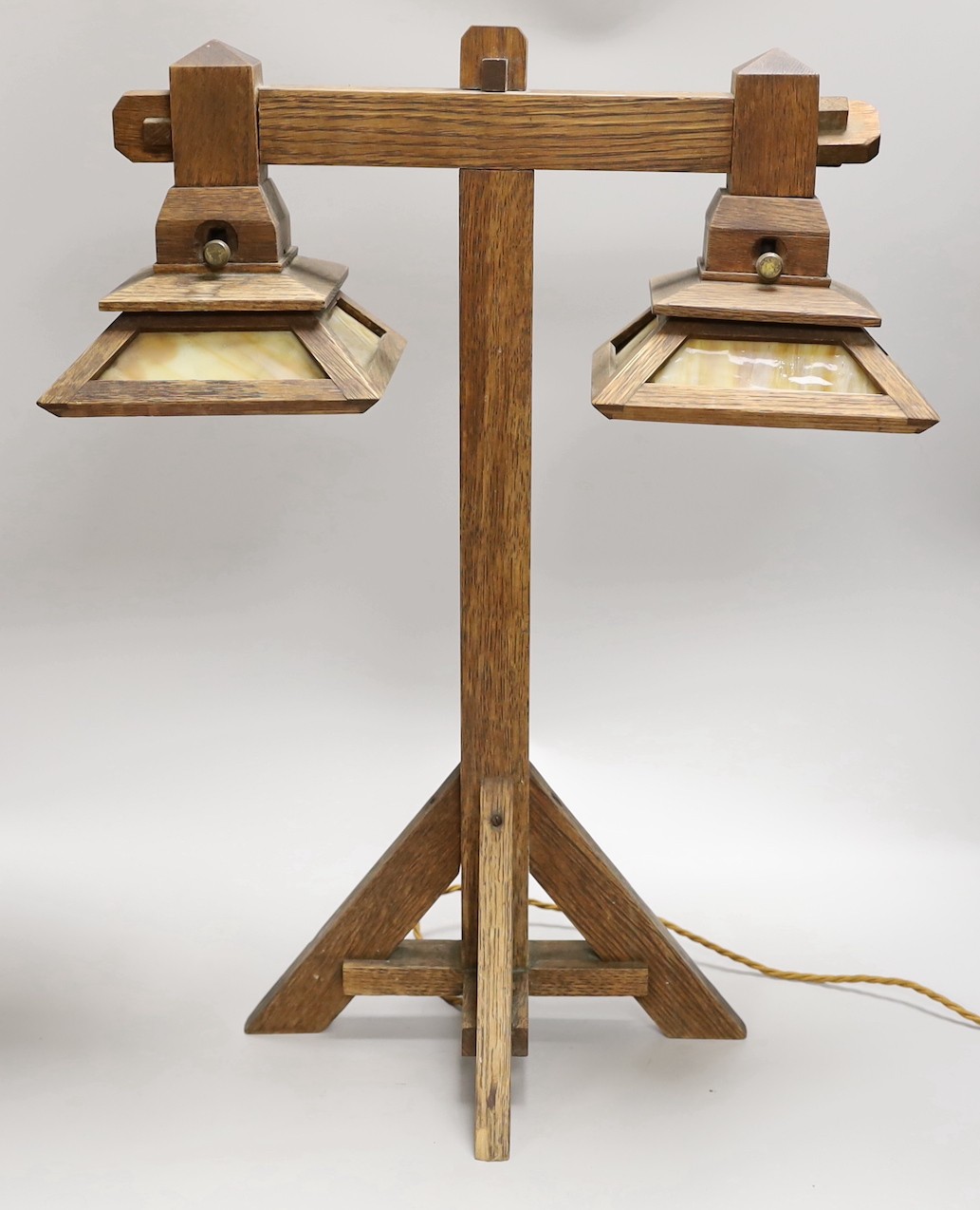 An oak mission-style lamp, 23cms high x 46cms wide